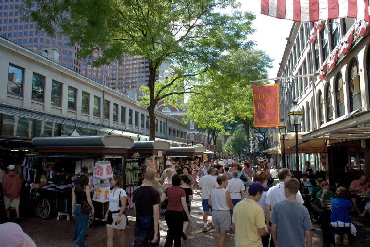 Bustling outdoor food and crafts market in downtown Boston, MA