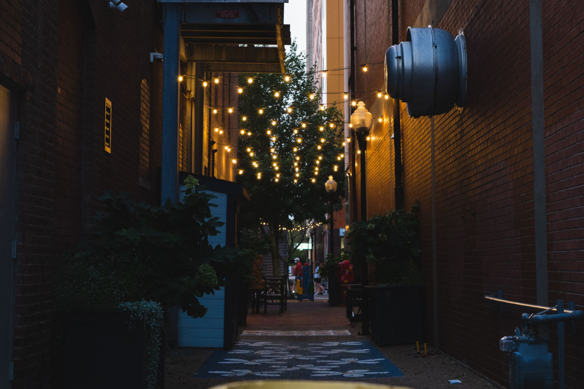 Outdoor dining in a brick-lined alley in Evansville, Indiana