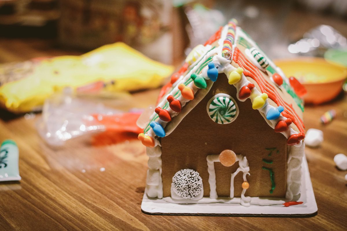 Holiday party themes: gingerbread houses and friendly competition make for a holiday themed good time for guests of all ages