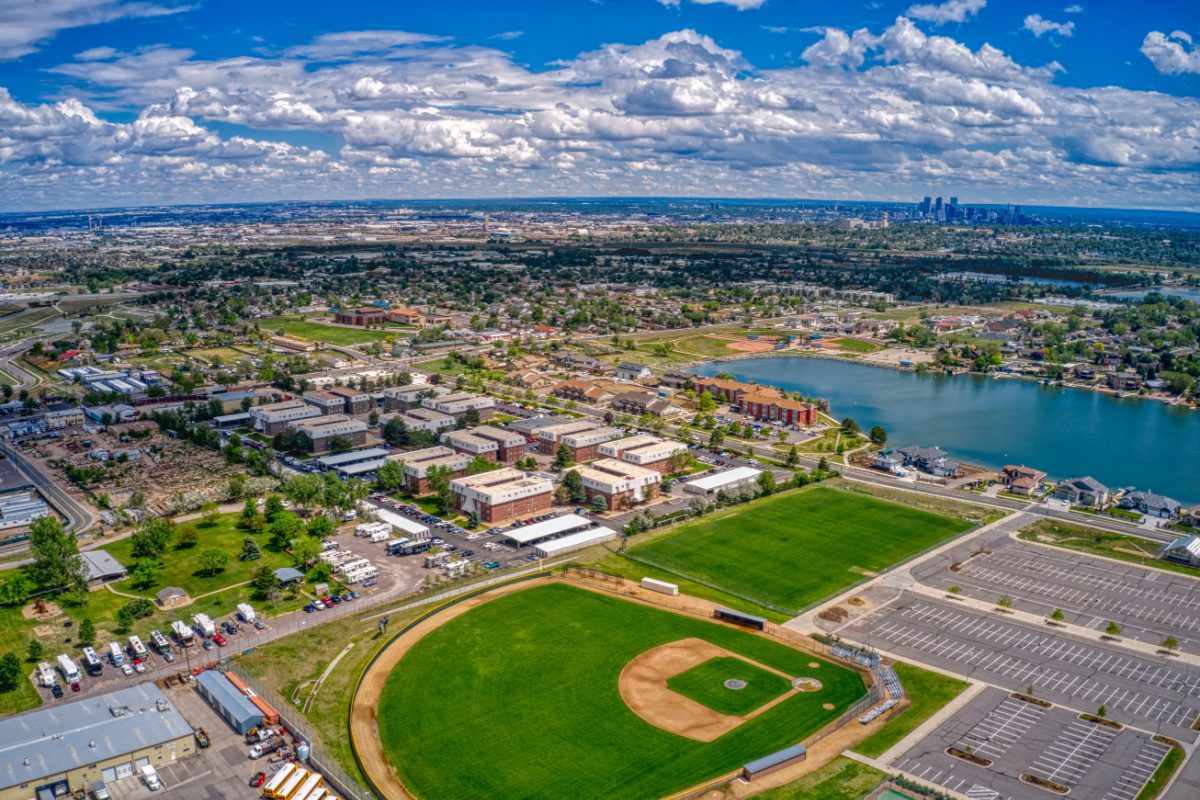 Aerial view of Westminster on a beautiful day in the Denver suburbs, where outdoor enthusiasts enjoy biking trails, great restaurants and outdoor fun near denver