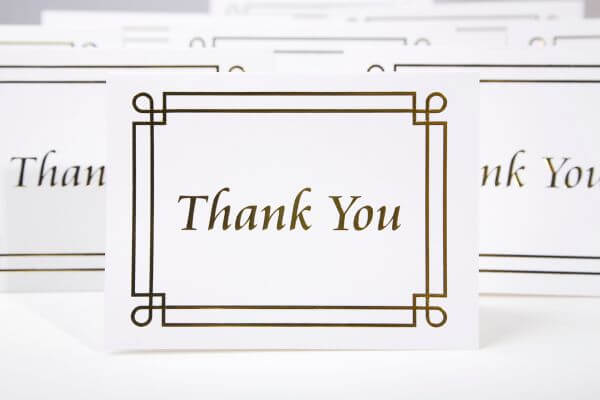 Image of the printable cards with a text of thank you in a white paper.